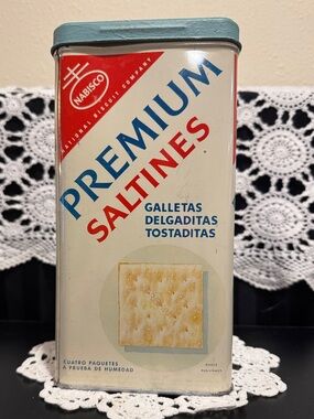 Nabisco Premium Saltines - Off White tin with Red, White & Blue Lettering.